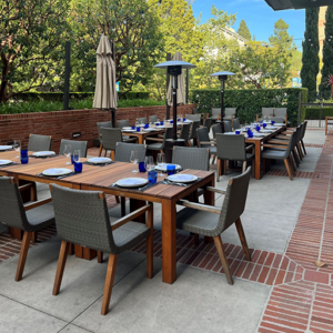 North Patio FS for 30 Plateia North Patio with tables, chairs, and place settings